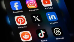 Picture of social media icons on a phone screen